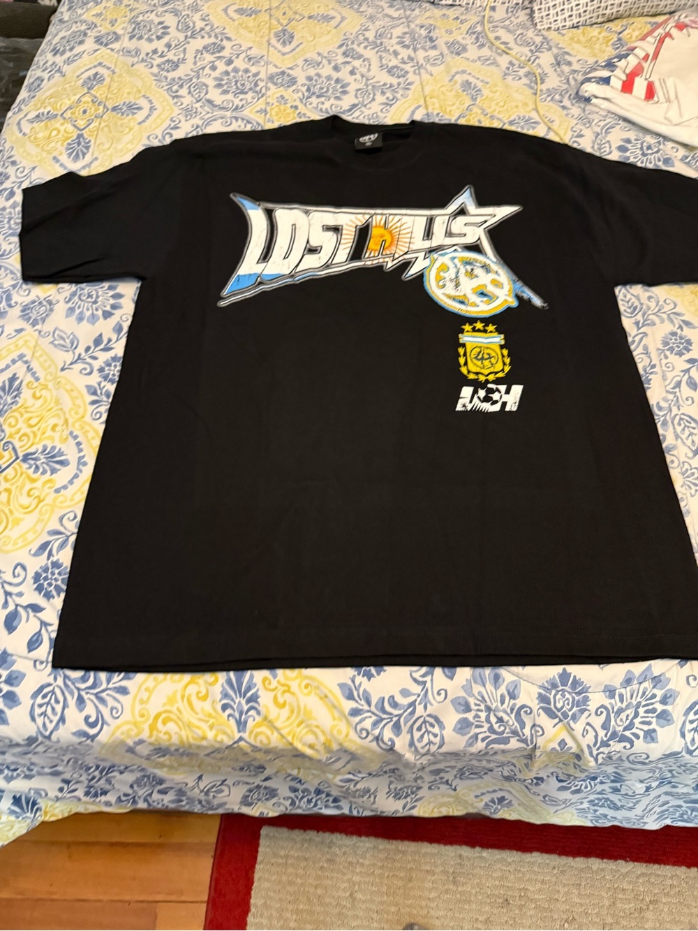 Lost Hills Argentina Black Tee with White Circular Logo on Neck Tag